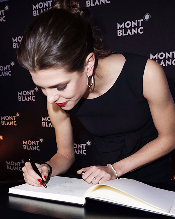 Montblanc-Charlotte-Casiraghi-signing-Montblanc-guestbook 