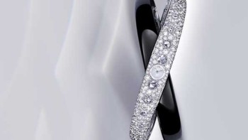 Rings of Saturn motif watch - Cartier