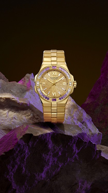 Alpine Eagle Summit in ethical 18-carat yellow gold featuring a bezel set with pink and white sapphires and a "Golden Peak" dial © Chopard