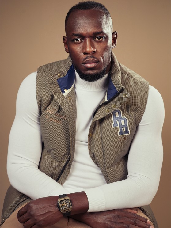 Usain Bolt wearing the Square Bang Unico Full Magic Gold © Hublot